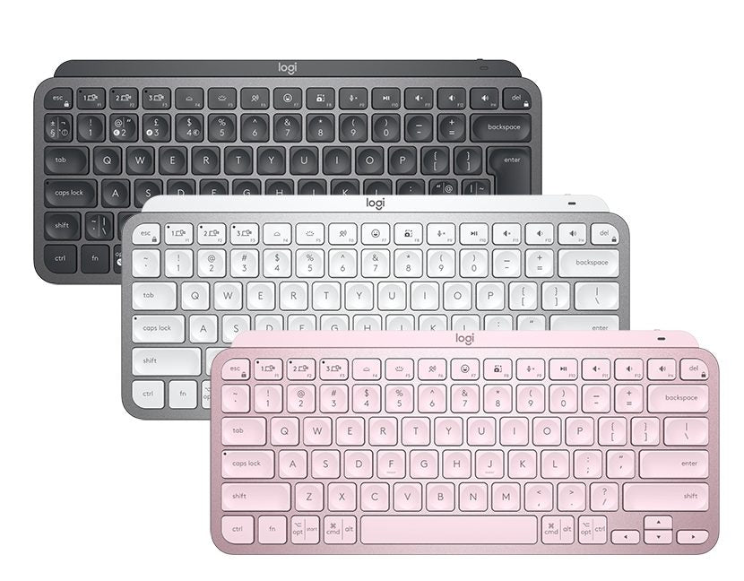 An image showing three Logitech MX Keys Mini wireless keyboards in pink, gray, and white colors, displayed in an overlapped fashion.